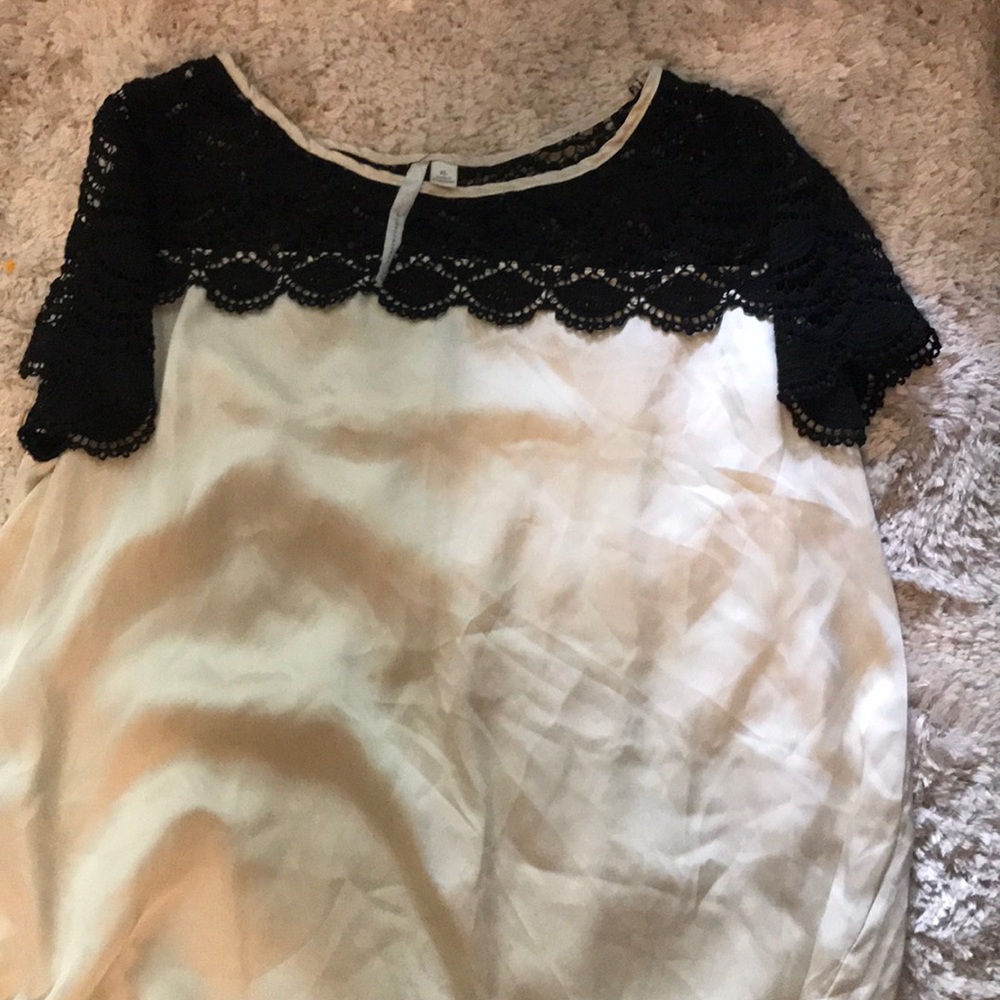 Sheer blouse with lace.